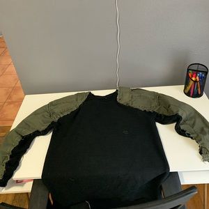 Hand sewn cargo sleeve sweater